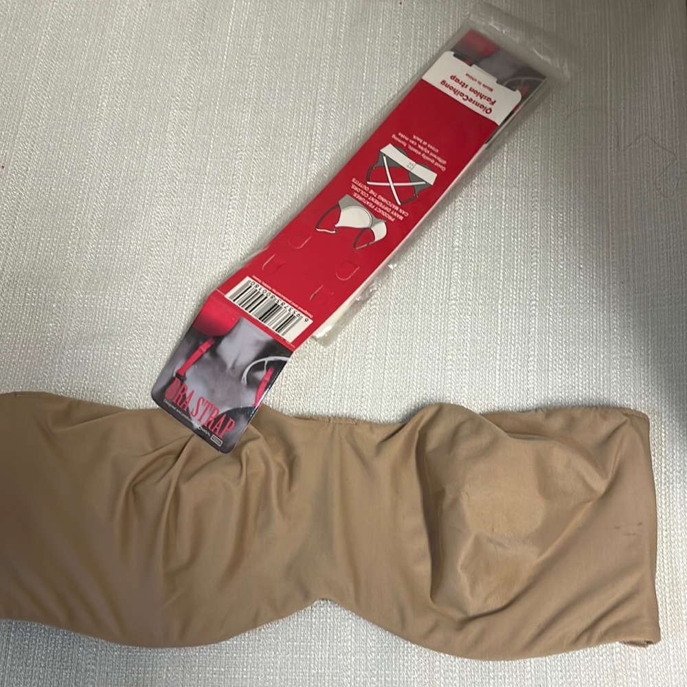 Strapless beige bra with clear elastic pack of straps